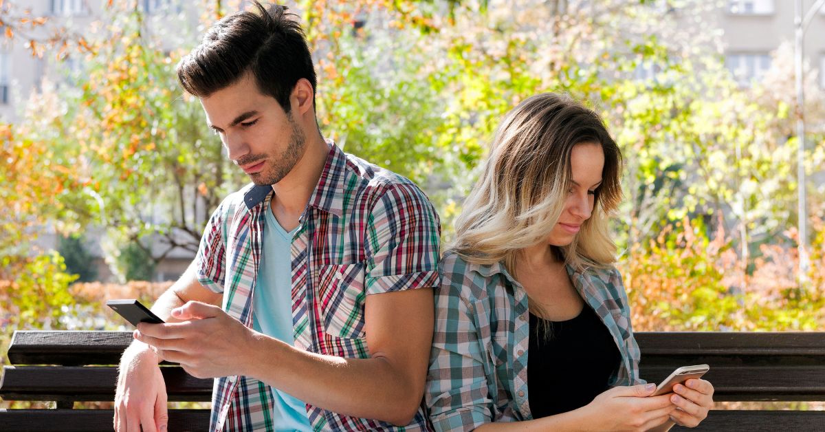 estranged couple on bench