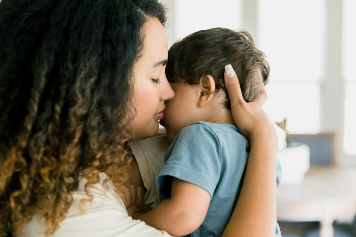 mother hugging son