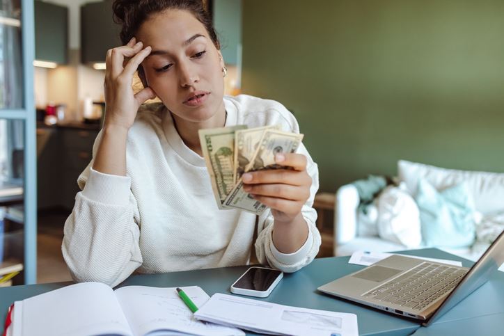 stressed parent counting money